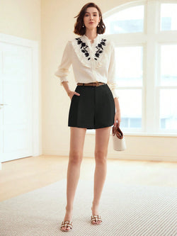 Shorts COM BOLSO EMBUTIDO E COSTURA DIAGONAL COM CINTO